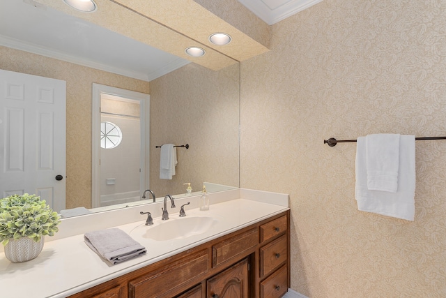 bathroom with vanity and crown molding