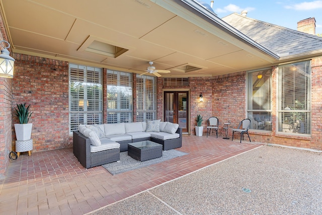 view of patio featuring outdoor lounge area, ceiling fan, and french doors