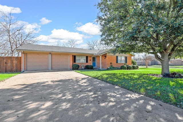 ranch-style home with a front lawn and a garage