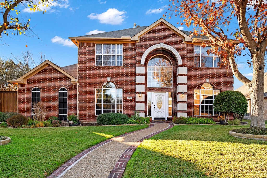 front of property with a front yard