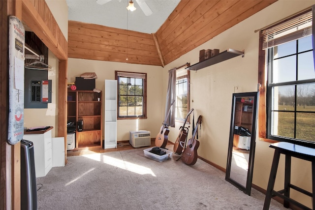 playroom featuring ceiling fan, lofted ceiling, light carpet, and wood ceiling