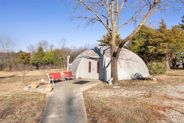 view of side of home featuring a patio area