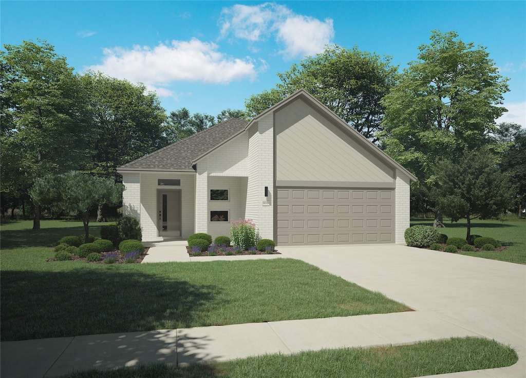 view of front facade with a garage and a front lawn