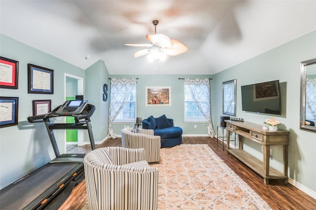 interior space with vaulted ceiling, dark hardwood / wood-style floors, and ceiling fan