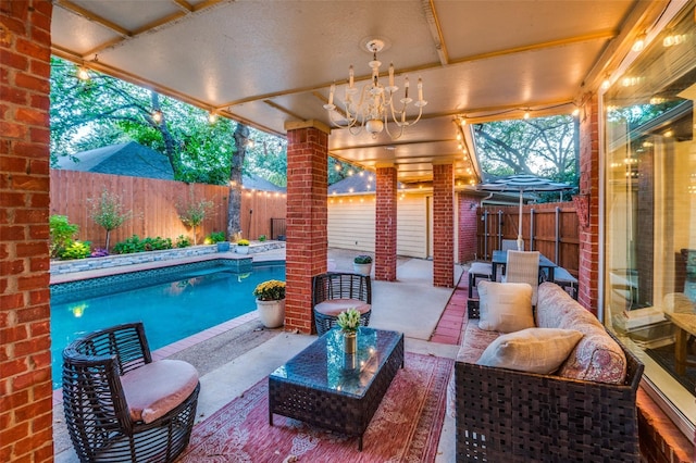 view of patio / terrace featuring a fenced in pool and outdoor lounge area