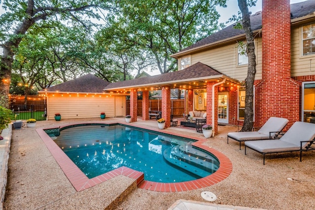 view of swimming pool with a patio area and outdoor lounge area