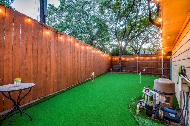 view of patio terrace at dusk