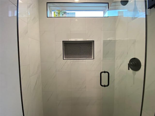 bathroom with an enclosed shower