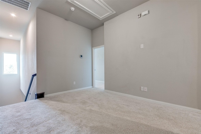 spare room featuring carpet floors