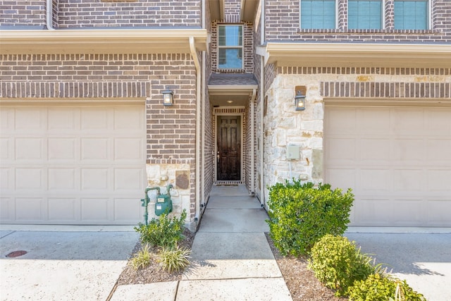 property entrance with a garage