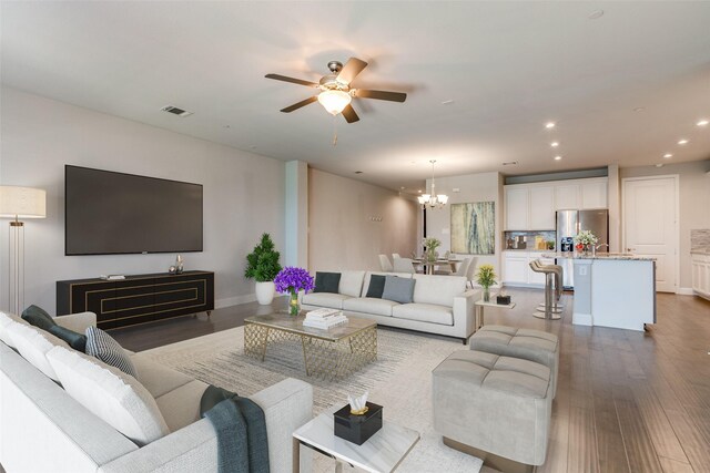 unfurnished living room with ceiling fan, dark hardwood / wood-style flooring, and french doors