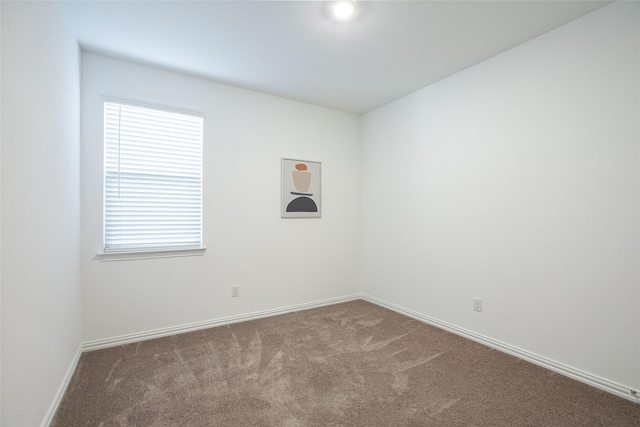 unfurnished room with carpet