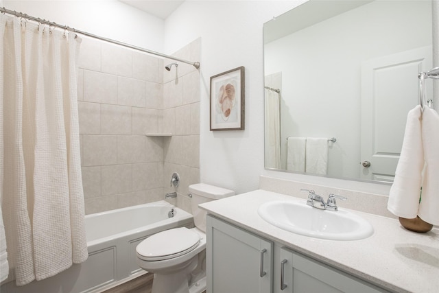 full bathroom with toilet, vanity, and shower / bathtub combination with curtain