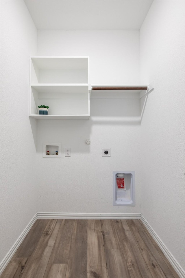 laundry room featuring electric dryer hookup, gas dryer hookup, hookup for a washing machine, and wood-type flooring