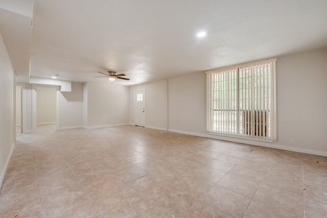 spare room featuring ceiling fan