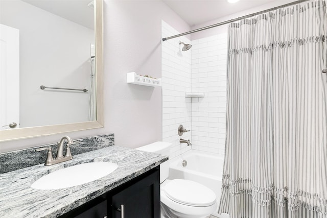 full bathroom featuring vanity, toilet, and shower / bathtub combination with curtain