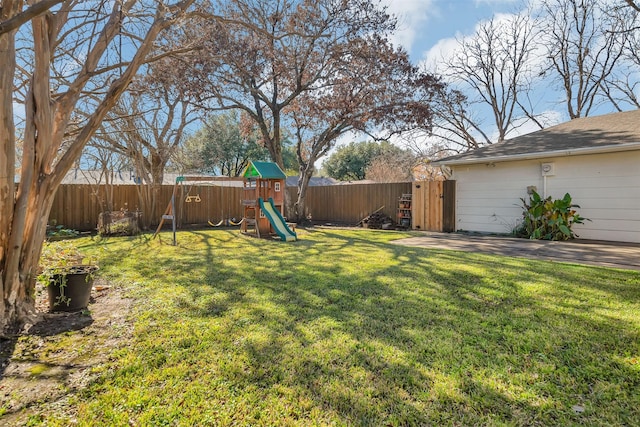 view of yard with a playground