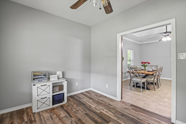 office space featuring ceiling fan and wood-type flooring