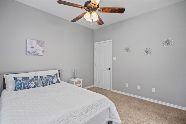 bedroom featuring ceiling fan and carpet