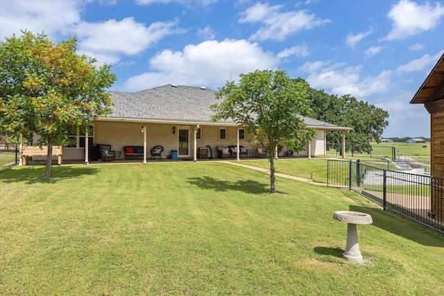 view of yard featuring outdoor lounge area and a patio