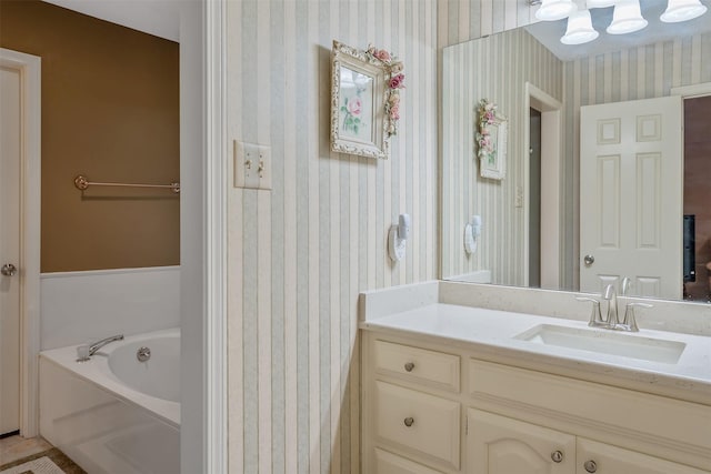 bathroom with a bathtub and vanity