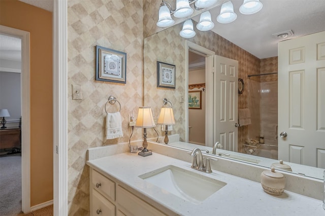 bathroom featuring vanity and shower / washtub combination