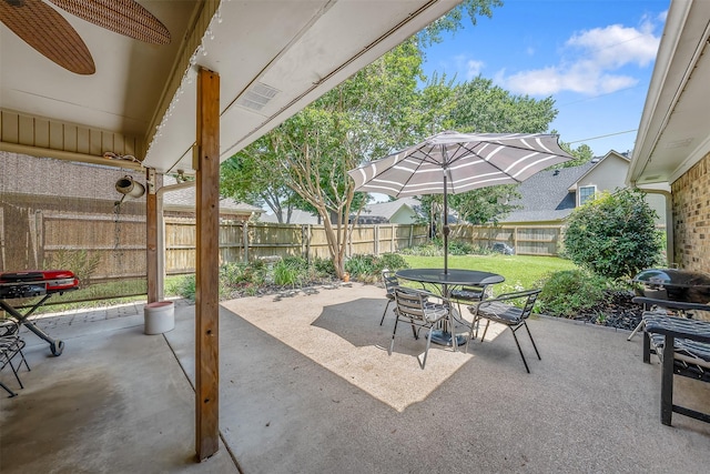 view of patio / terrace featuring ceiling fan