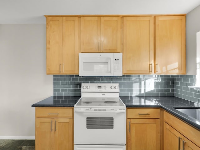 kitchen featuring electric range, decorative backsplash, sink, and dark stone counters