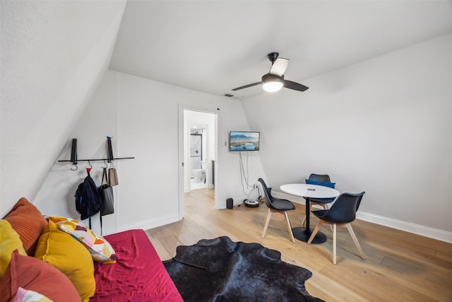 interior space with ceiling fan and light hardwood / wood-style flooring