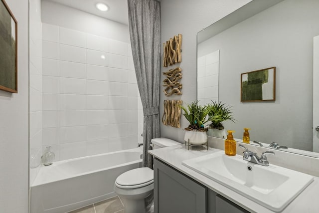 full bathroom with toilet, shower / tub combo with curtain, vanity, and tile patterned flooring