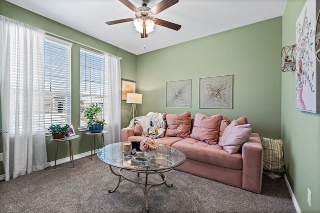 living room featuring carpet flooring and ceiling fan