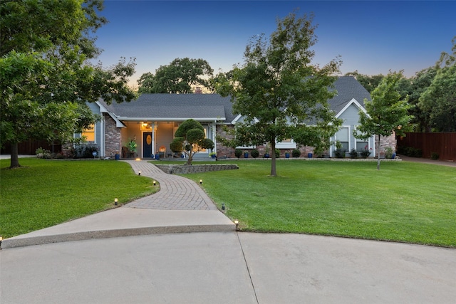 view of front of home with a front yard