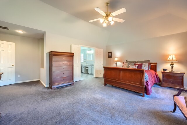 unfurnished bedroom with vaulted ceiling, carpet floors, ensuite bath, and ceiling fan