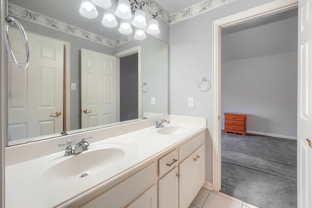 bathroom with tile patterned flooring and vanity