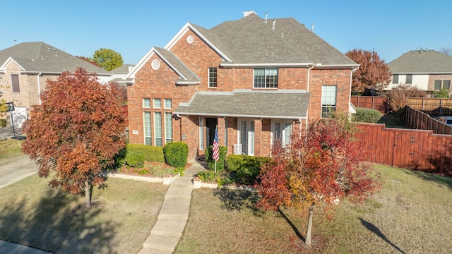 view of front property featuring a front yard