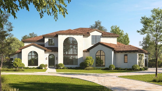 view of front of house with stucco siding, a tiled roof, and a front lawn