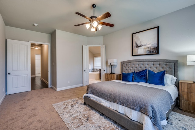 bedroom featuring ceiling fan, carpet floors, connected bathroom, and baseboards