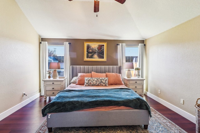 bedroom featuring dark wood-type flooring, ceiling fan, and lofted ceiling