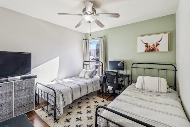 bedroom featuring dark hardwood / wood-style floors and ceiling fan