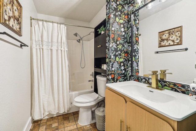 full bathroom with shower / bath combo, vanity, and toilet