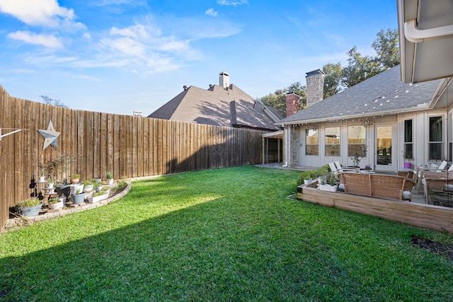 view of yard featuring a fenced backyard