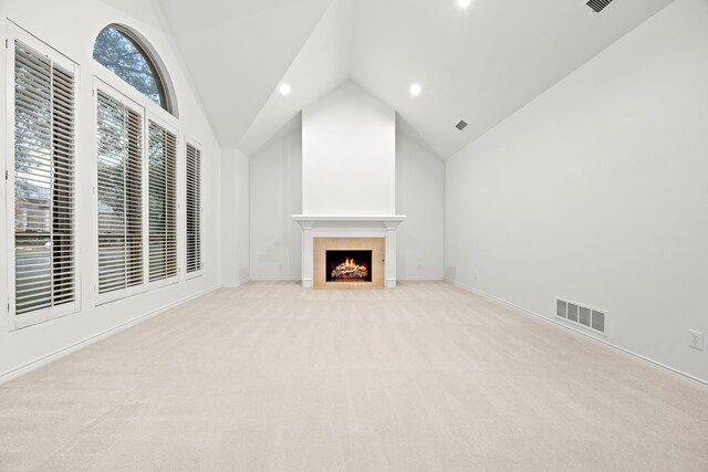 dining space with dark wood-type flooring, a high ceiling, and an inviting chandelier