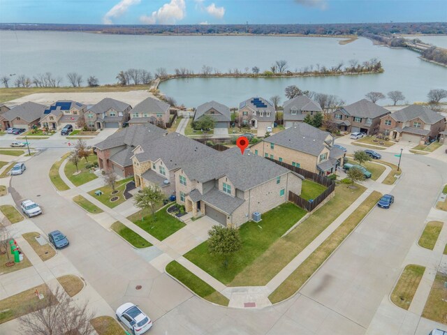 1917 Edgewater Dr, Garland, TX 75043 - view of front of home featuring an attached garage, driveway, brick siding, and stone siding