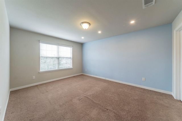 view of carpeted spare room