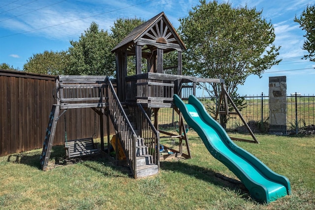 view of playground featuring a lawn