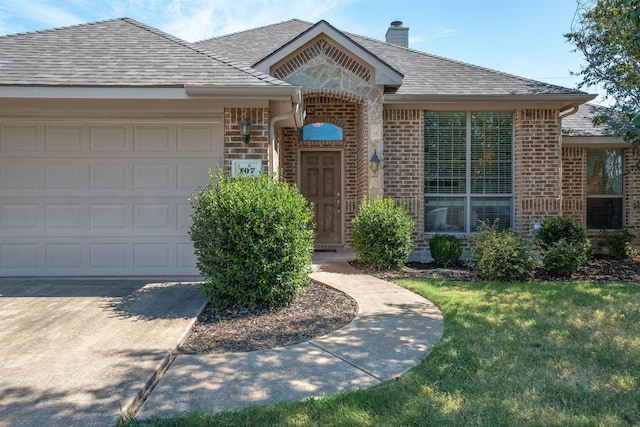 single story home featuring a garage