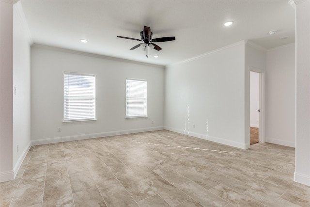 empty room with ceiling fan and ornamental molding