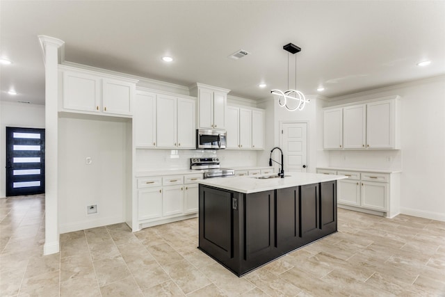 kitchen with a kitchen island with sink, sink, white cabinets, and stainless steel appliances