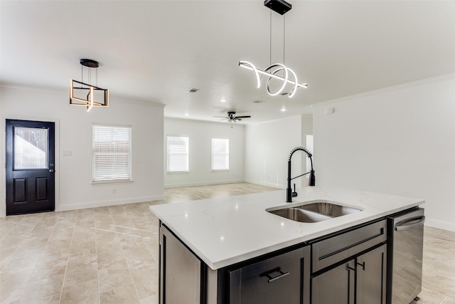 kitchen with light stone counters, sink, decorative light fixtures, a center island with sink, and dishwasher