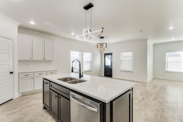 kitchen with dishwasher, an island with sink, white cabinetry, and sink